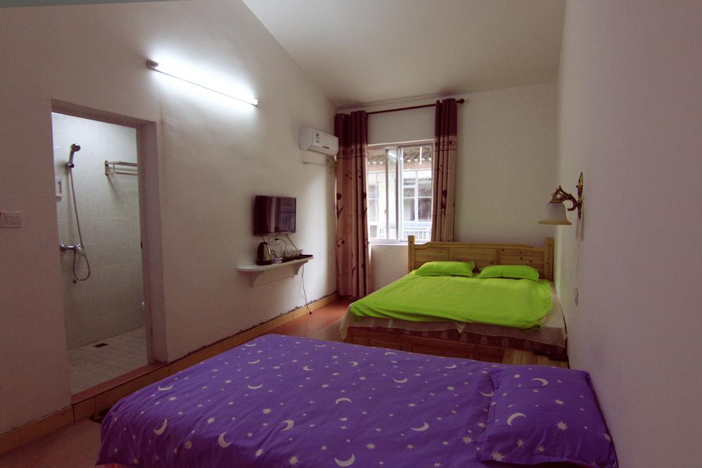 Lan Shan Chu Youth Hostel Yangshuo Habitación foto