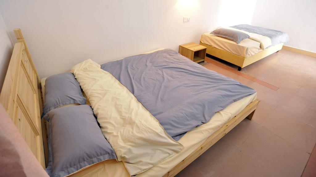 Lan Shan Chu Youth Hostel Yangshuo Habitación foto